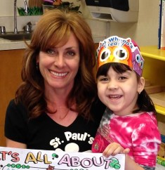 Mrs. Monier's students share their All About Me poster with her classmates